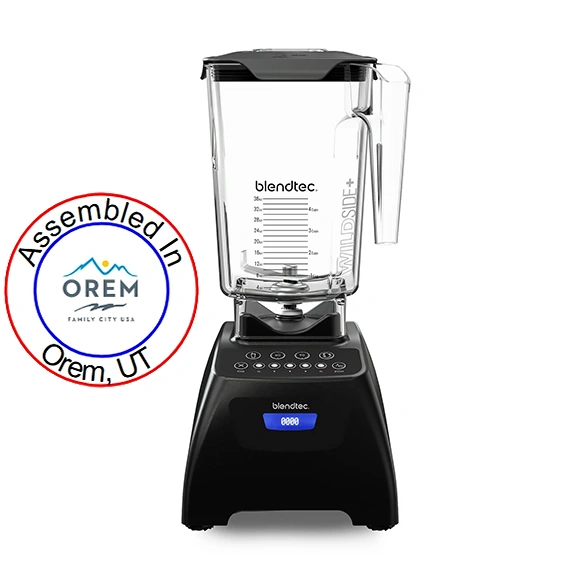 A Blendtec Blender that includes circular badge that says 'Assembled in Orem, UT' spelled out along the outer ring, with the official Orem, UT symbol in the center.